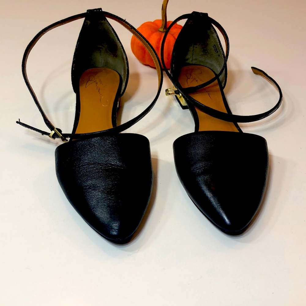 Black flats with small ankle buckle